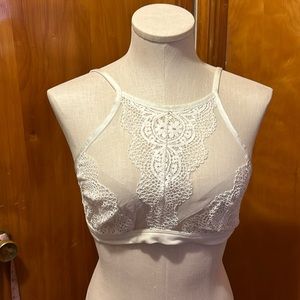 Victoria’s Secret bralette cream sheer with lace detail. Racerback option hook.